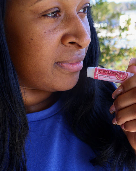Pomegranate lip balm — deep, tart fruit without the candy sweetness. Rinse Bath & Body Co.