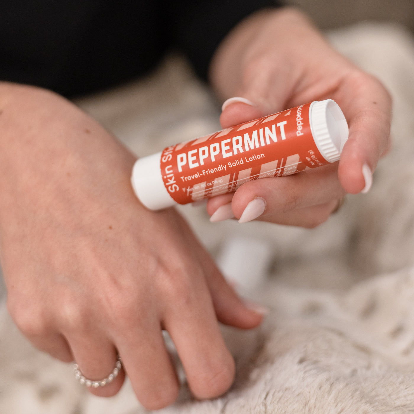 Peppermint solid lotion stick from Rinse - concentrated moisture bar - alternate angle