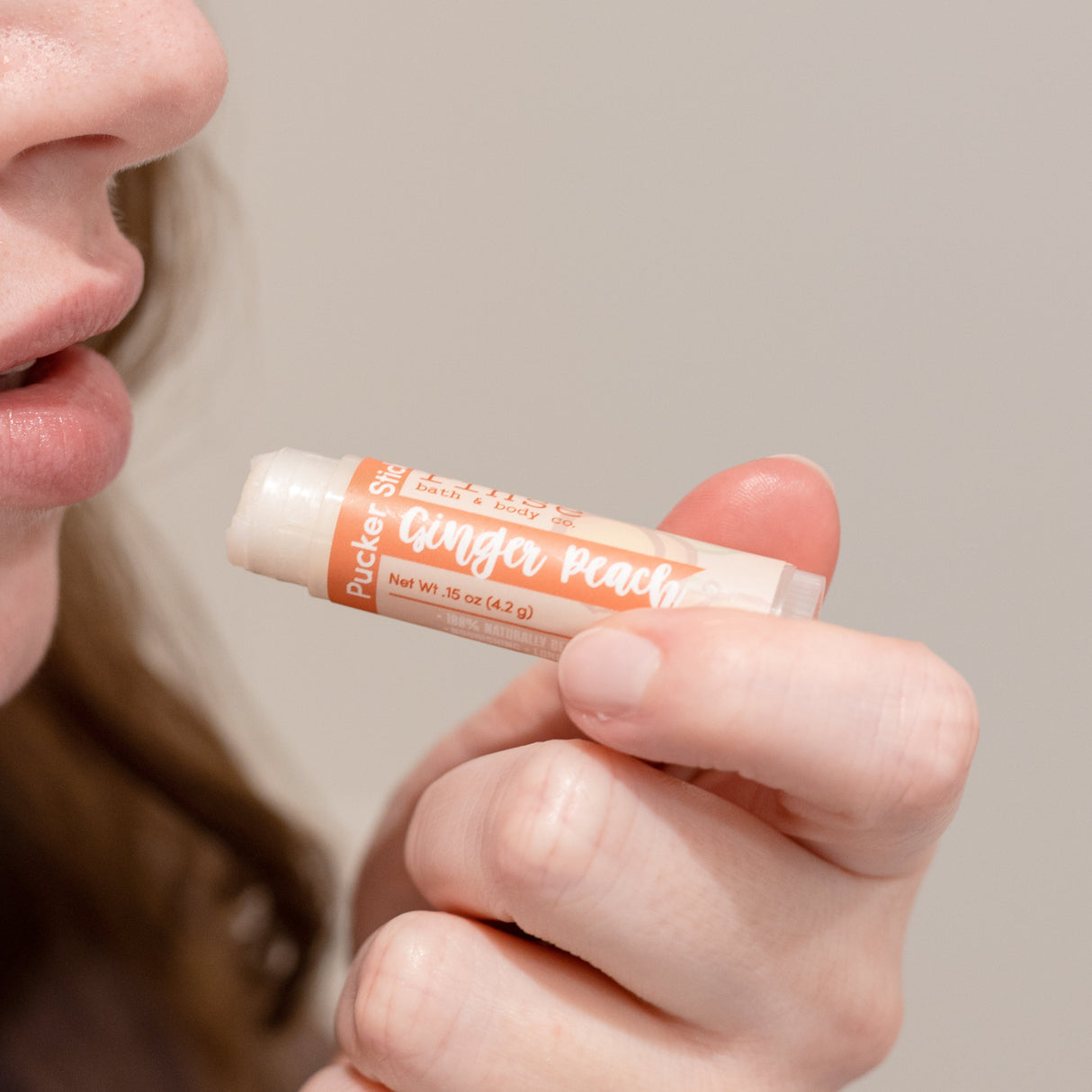 Ginger Peach natural lip balm from Rinse - nourishing lip care - alternate angle