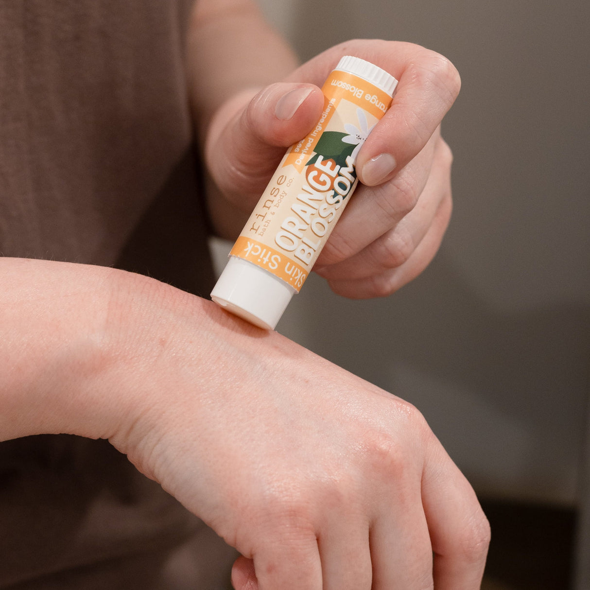 solid lotion stick in Orange Blossom by Rinse Bath & Body - alternate angle