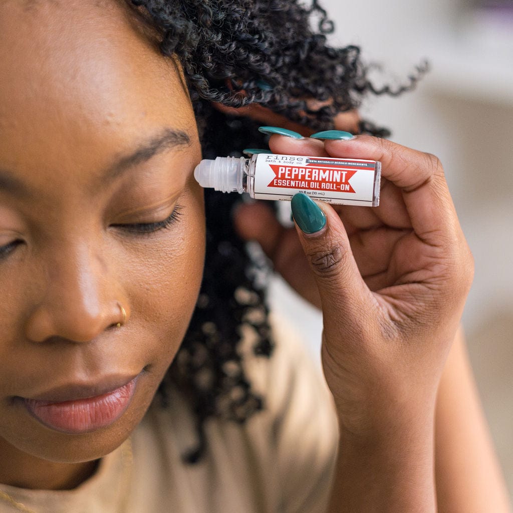 essential oil roll-on in Peppermint by Rinse Bath & Body - alternate angle