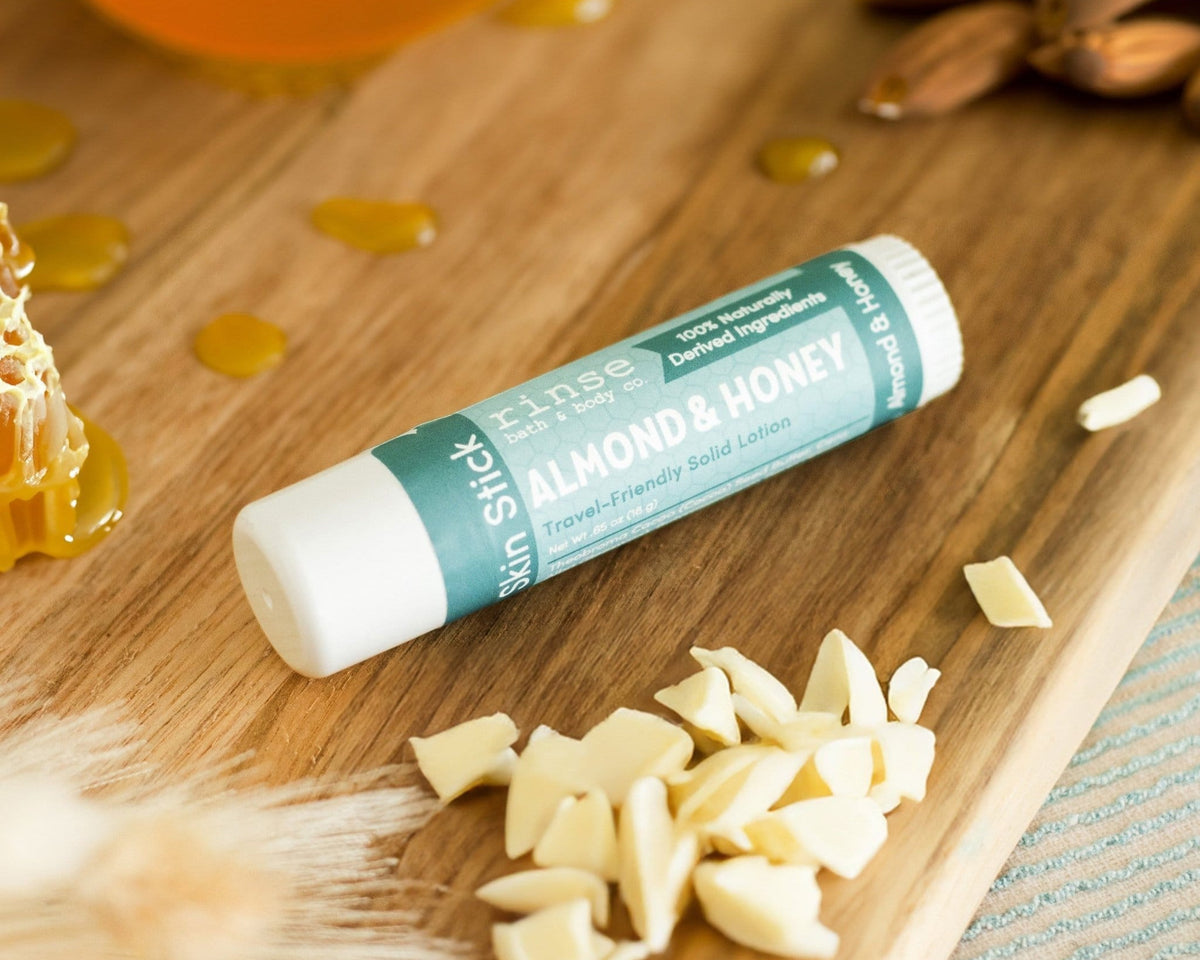 Almond & Honey Solid Lotion Skin Stick styled with almonds and honey — Rinse Bath & Body Co.