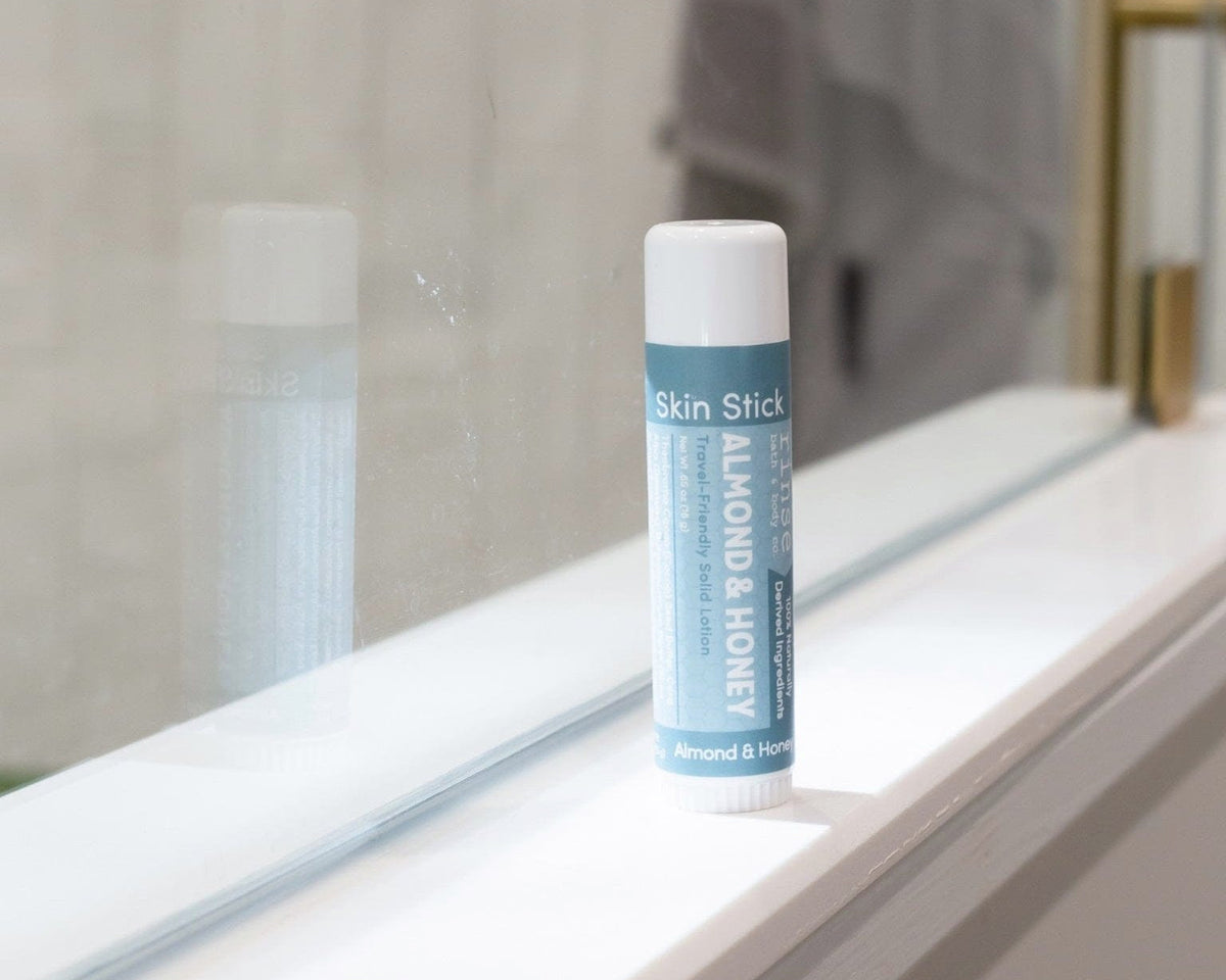 Almond & Honey Solid Lotion Skin Stick styled with almonds and honey — Rinse Bath & Body Co.