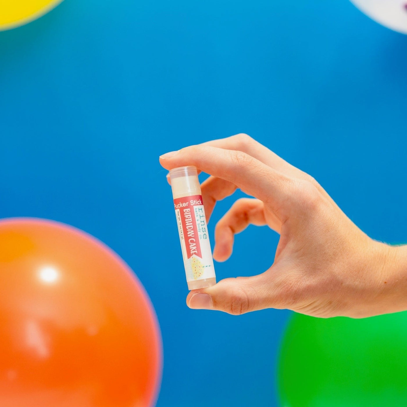 Birthday Cake natural lip balm from Rinse - nourishing lip care - alternate angle