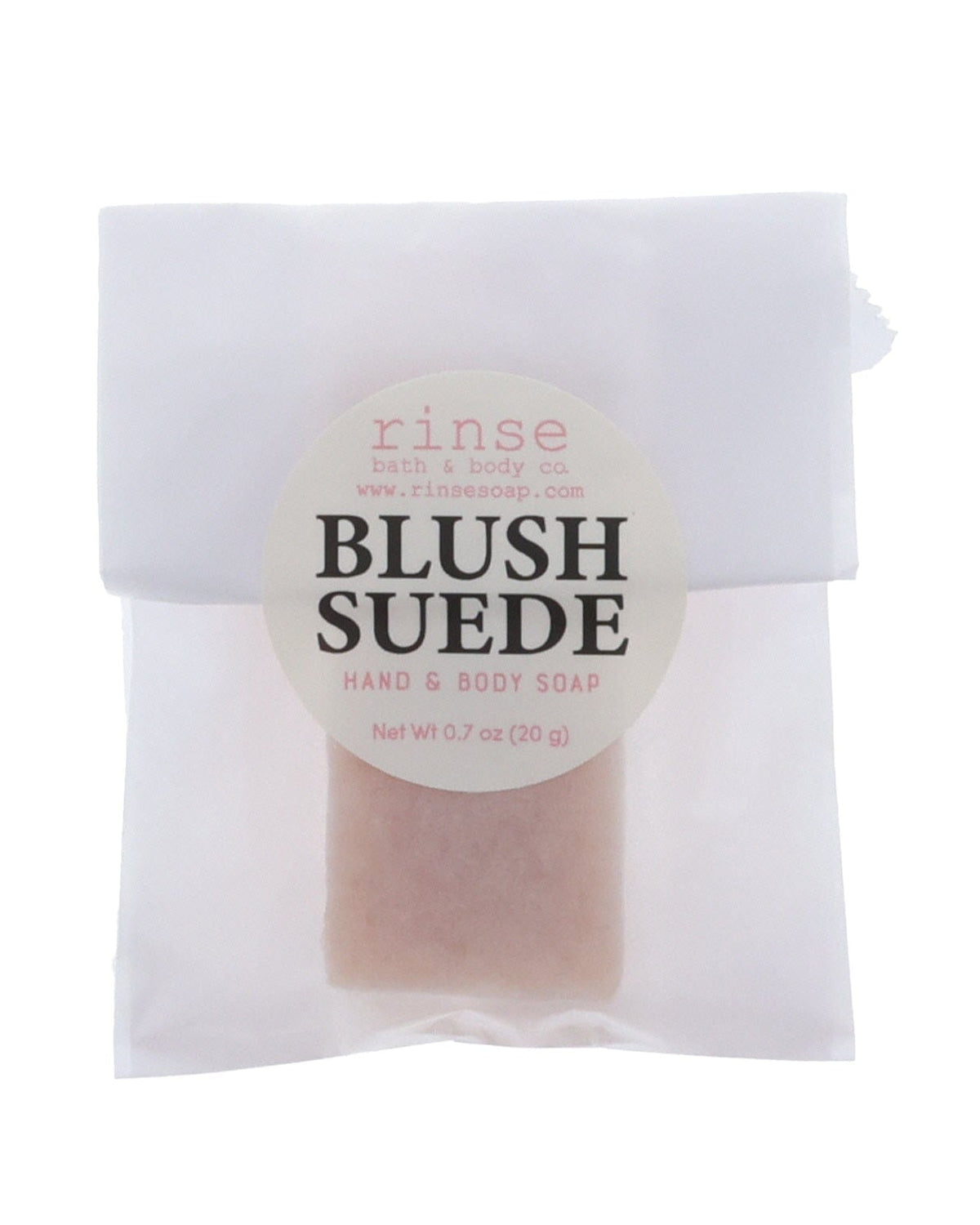 Blush Suede soap slice in translucent glassine — circle sticker crisp on clean bright white