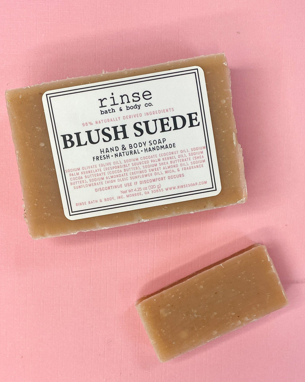 Full Blush Suede bar and thin slice on candy pink — warm tan-pink soap in soft flat-lay light