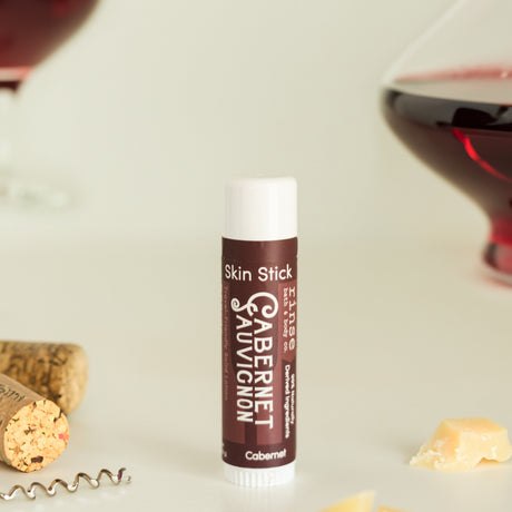 solid lotion stick in Cabernet by Rinse Bath & Body - lifestyle shot