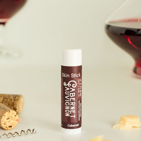 solid lotion stick in Cabernet by Rinse Bath & Body - lifestyle shot