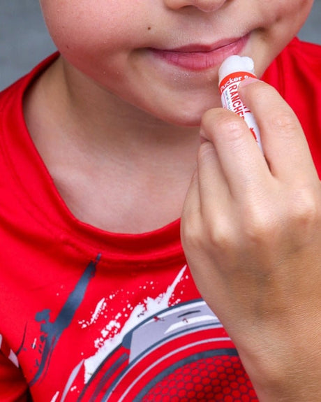Cherry Rancher Lip Balm in use — Rinse Bath & Body Co.