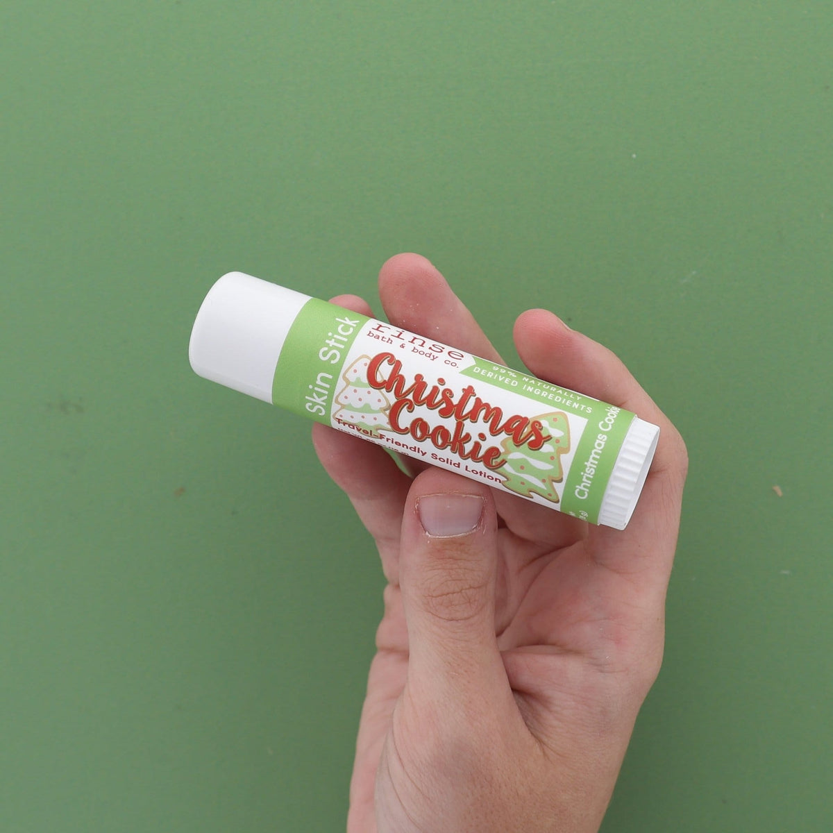 Christmas Cookie Skin Stick — travel-friendly solid lotion in a twist-up tube. Rinse Bath & Body Co.
