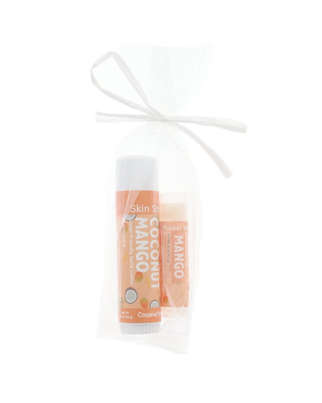Coconut Mango Skin Stick and Mango Pucker Stick tied in a sheer white gift bag with a white ribbon bow