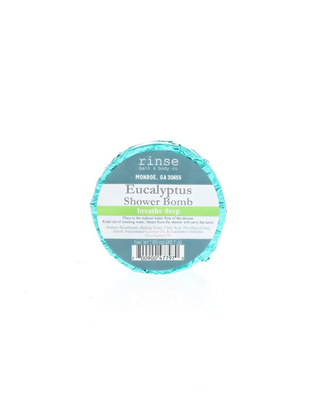 Eucalyptus Shower Bomb sits wrapped in foil with its current Rinse label; shown for display; listing is for one (1)