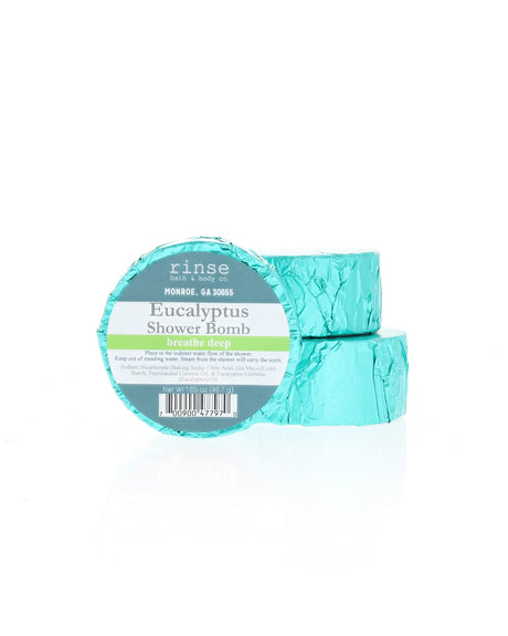 Two Eucalyptus Shower Bombs stack in foil wrap with the current Rinse label; shown for display; listing is for one (1)