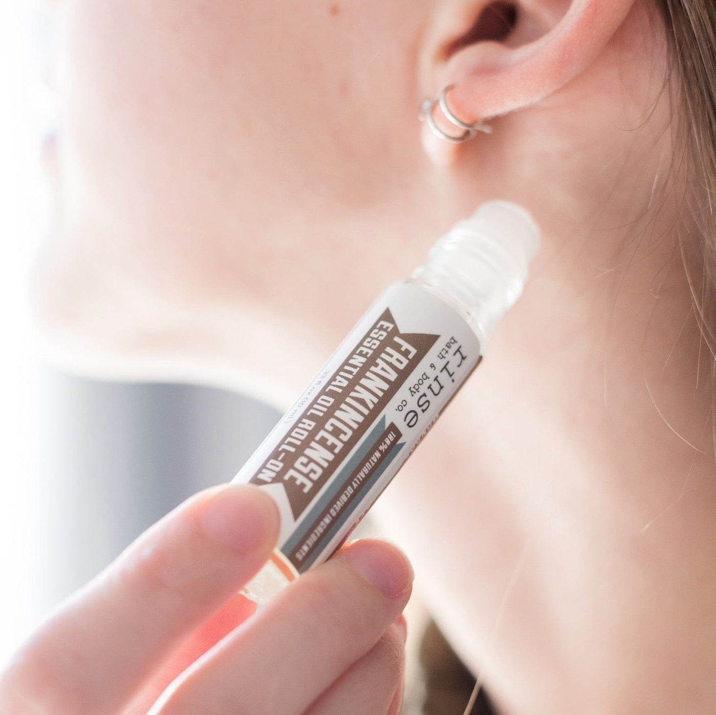 essential oil roll-on in Frankincense by Rinse Bath & Body - alternate angle