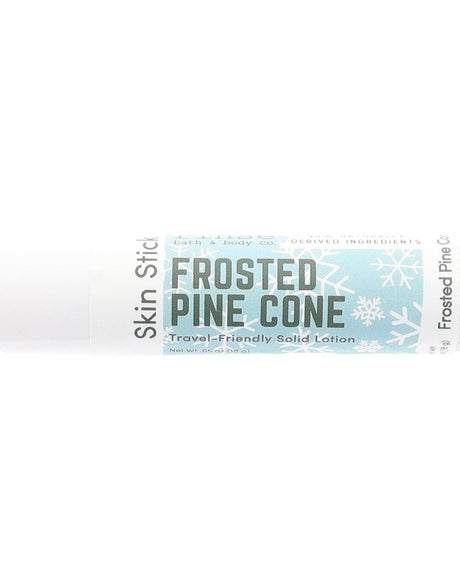 Frosted Pine Cone Skin Stick stylized on bright white — soft blue snowflake label in clean studio light