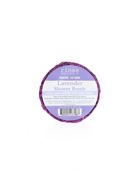Lavender Shower Bomb sits wrapped in foil with its current Rinse label; shown for display; listing is for one (1)