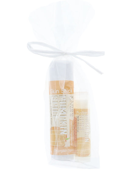 The Pumpkin Spice duo — solid lotion skin stick and lip balm pucker stick together, boxed and ready to give. Rinse Bath & Body Co.