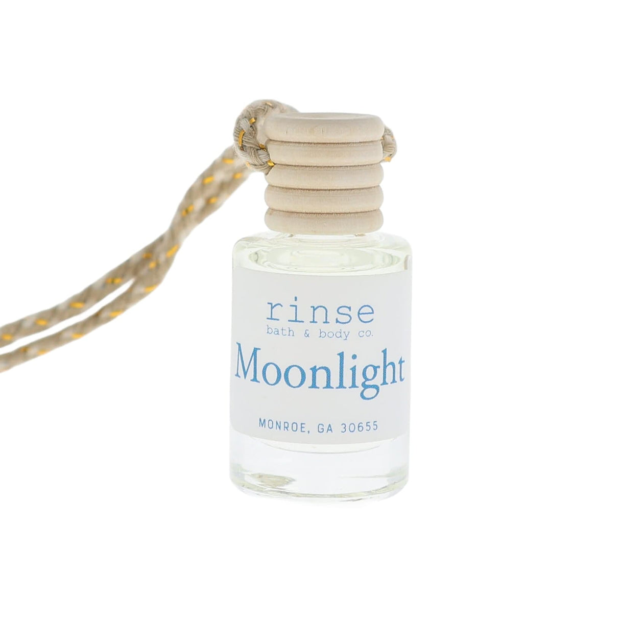 Small bottle labeled 'Moonlight' with a string on a white background