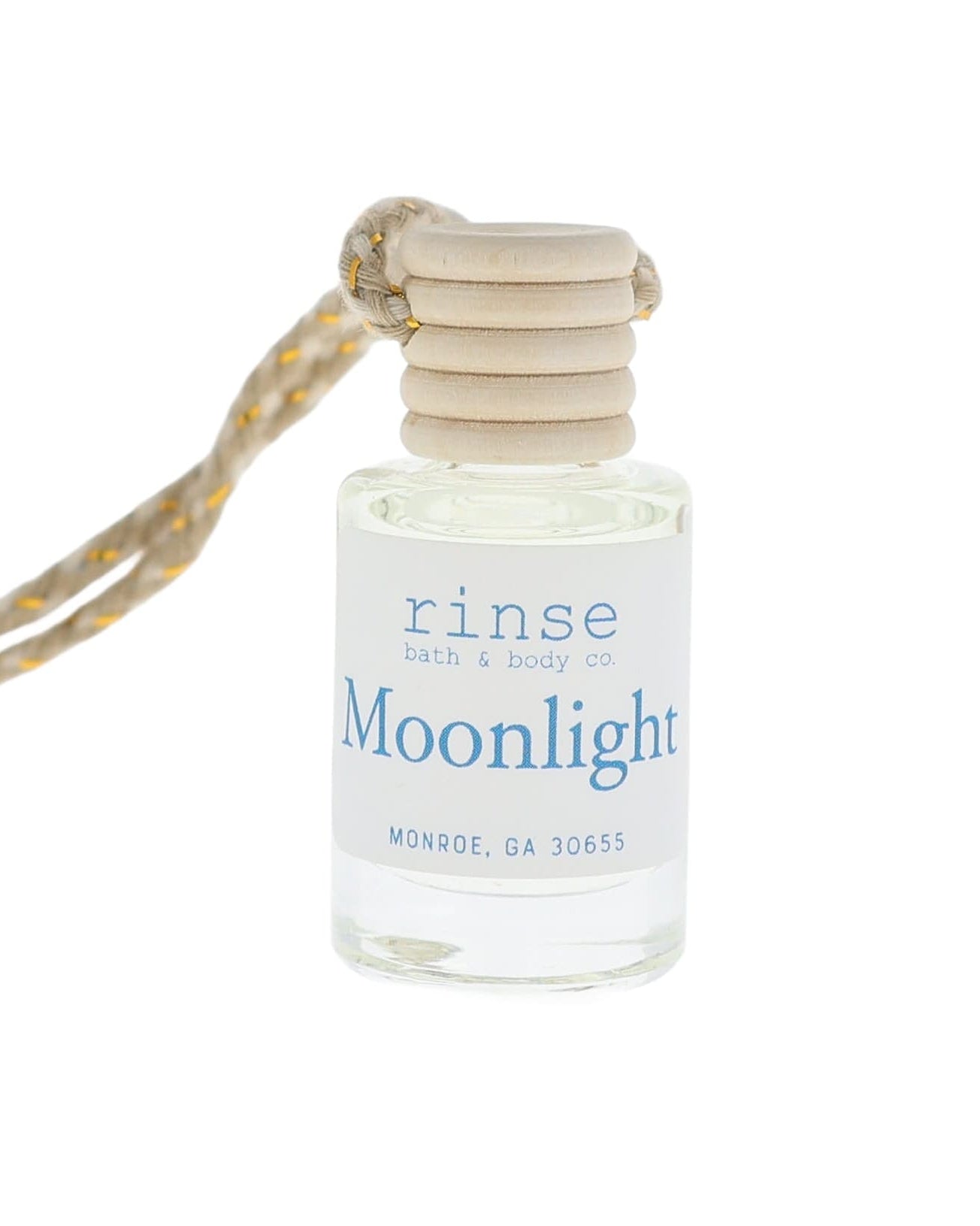 Small bottle labeled 'Moonlight' with a string on a white background