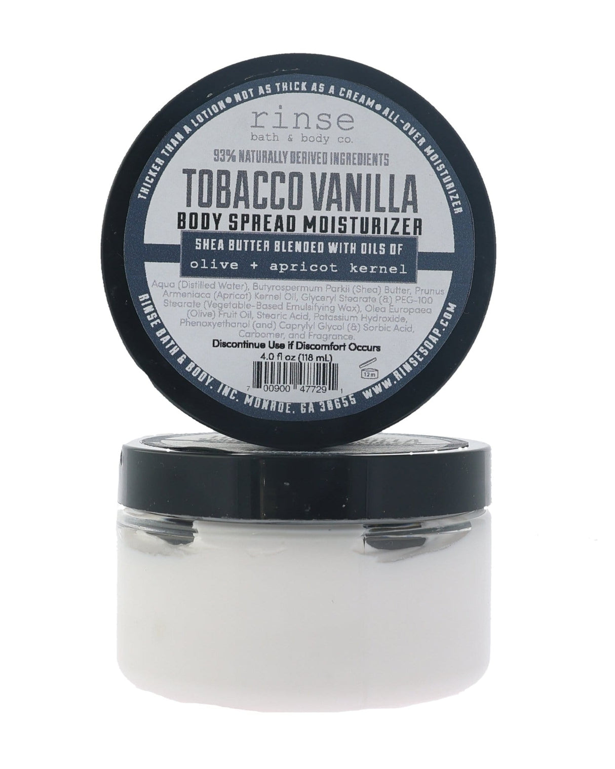 Tobacco Vanilla body spread in its tub with the lid off, showing the whipped butter inside. Rinse Bath & Body Co.