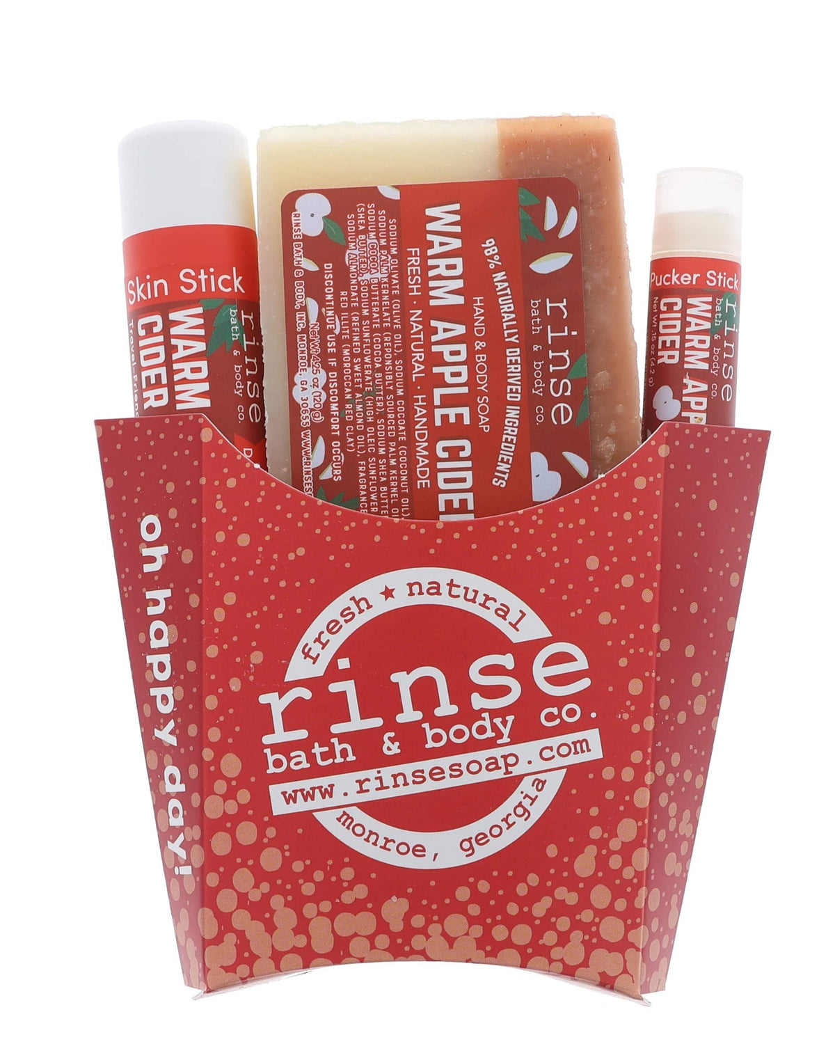 Red polka-dot fry carton holding Warm Apple Cider soap Skin Stick and Pucker — apple labels on bright white