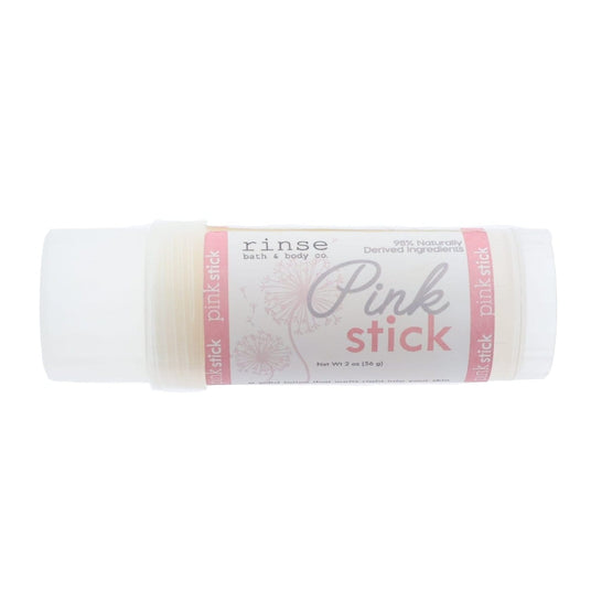 The Pink Skin Stick in its script-labelled tube on white — a 2 oz twist-up solid lotion, the largest stick in the range. Rinse Bath & Body Co.