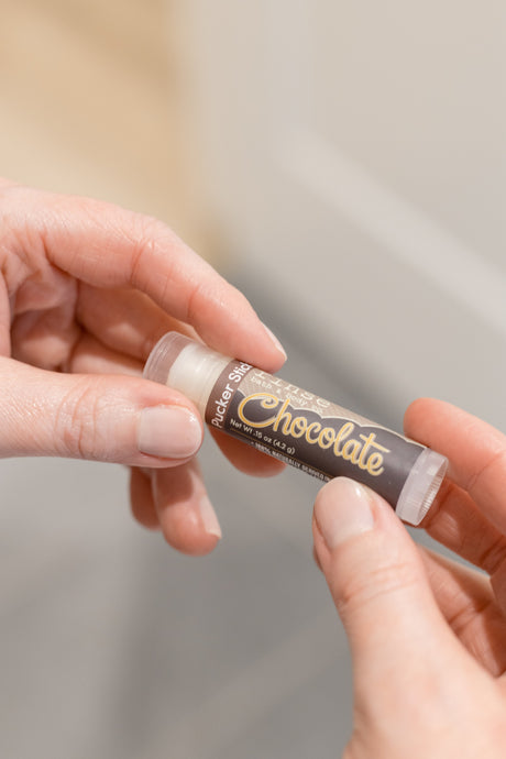 Natural lip balm in use — teacher gifts