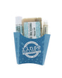 The Frosted Pine Cone fry-box gift set in its blue snowflake carton — Frosted Pine Cone bar soap, Frosted Pine Cone solid lotion skin stick and a Vanilla lip balm. Rinse Bath & Body Co.