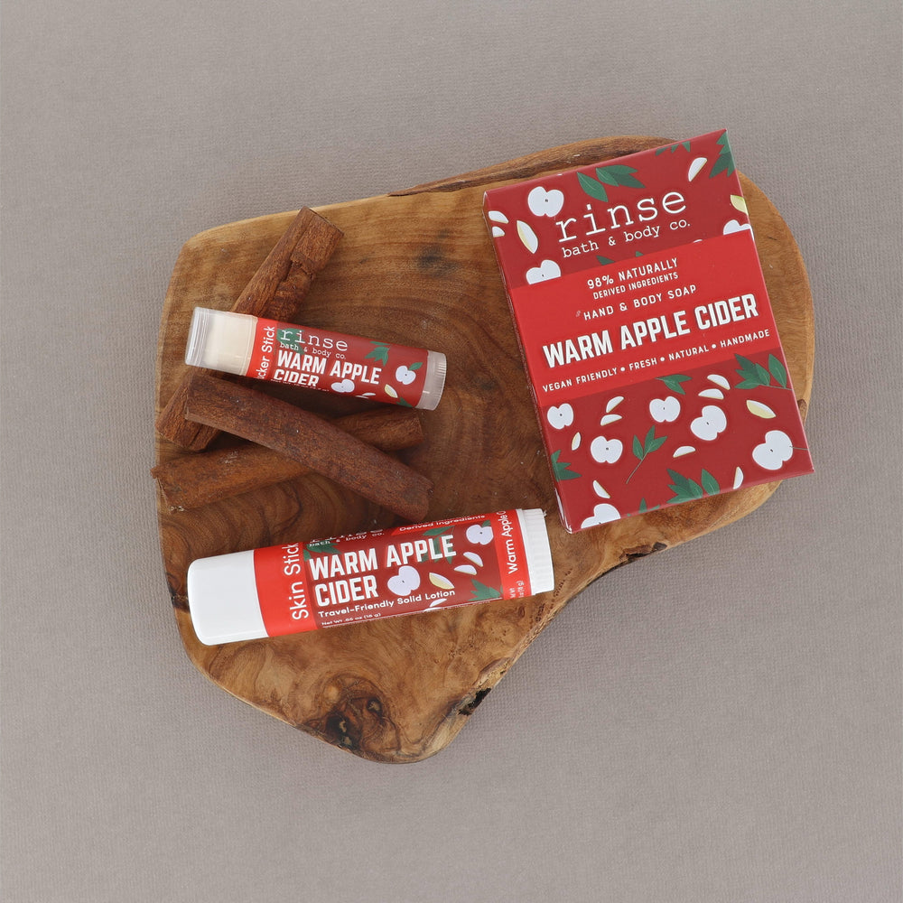 Warm Apple Cider Solid Lotion styled with cider cue — Rinse Bath & Body Co.