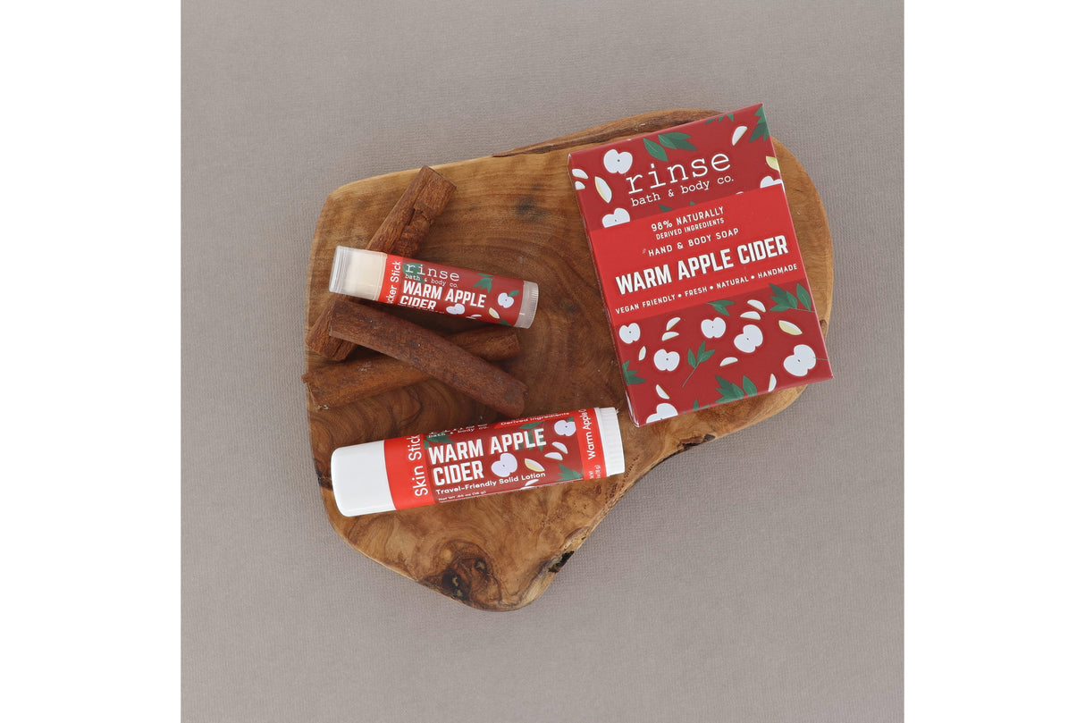 Warm Apple Cider Solid Lotion styled with cider cue — Rinse Bath & Body Co.