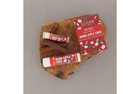 Warm Apple Cider Solid Lotion styled with cider cue — Rinse Bath & Body Co.