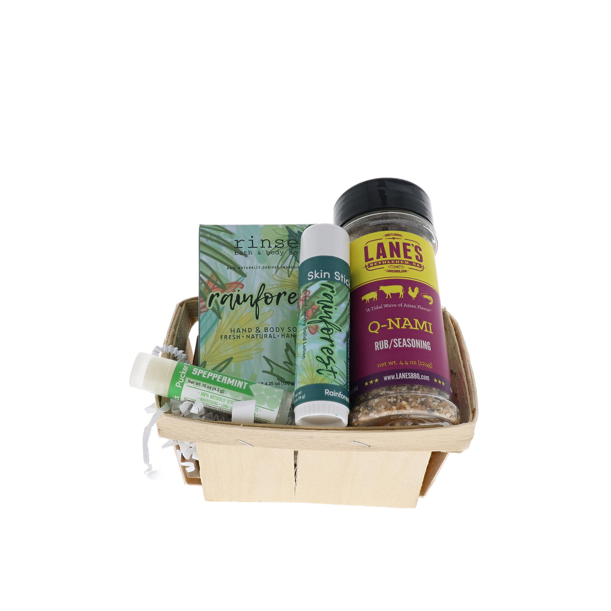 Board Shorts Dad bundle in wooden berry basket with Rinse Rainforest soap, skin stick and Lane's Q-NAMI rub