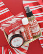 Peppermint Patti travel gift set packed in a berry till on red and white candy-stripe foil, labels facing up
