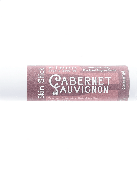 Cabernet Skin Stick — travel-friendly solid lotion in a twist-up tube. Rinse Bath & Body Co.