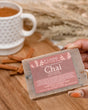 Chai Tea bar soap in use, lather worked up by hand — black tea, cinnamon and cardamom over a cocoa-butter base. Rinse Bath & Body Co.