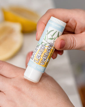 Lemon Verbena solid lotion stick — bright citrus in a twist-up bar of concentrated moisture. Rinse Bath & Body Co.