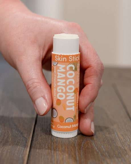 Coconut Mango solid lotion stick by Rinse Bath & Body