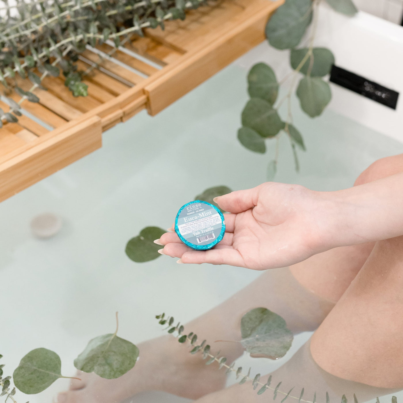 bath bomb in Euca Mint by Rinse Bath & Body - lifestyle shot