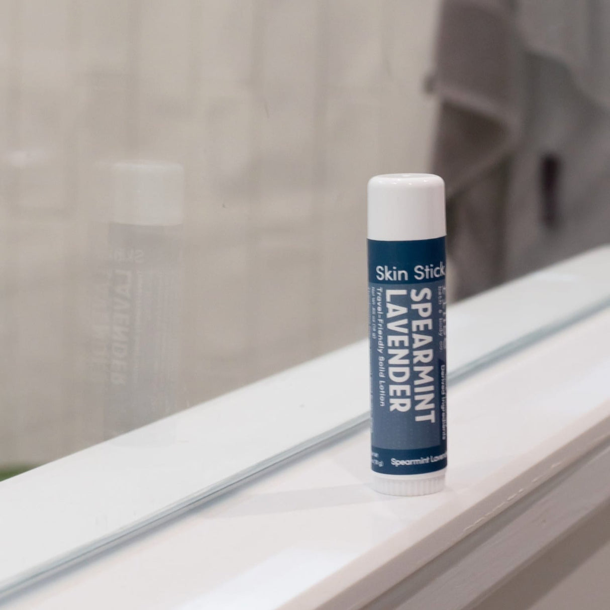 solid lotion stick in Spearmint Lavender by Rinse Bath & Body - detail view