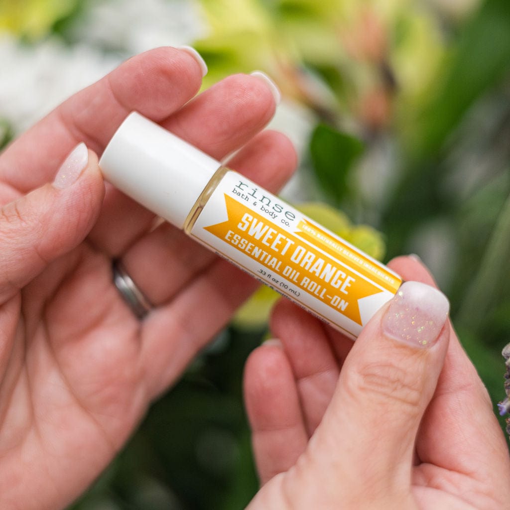 Sweet Orange essential oil roll-on from Rinse - ready to apply blend - lifestyle shot