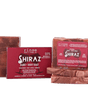 Marbled Shiraz soap slabs and burgundy box against black — blackberry, plum, spice, and chocolate