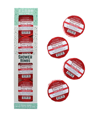 The Peppermint Shower Steamer 4-pack carton standing upright beside its four red foil-wrapped pucks — four steamers, gift-boxed and ready to hand over. Rinse Bath & Body Co.