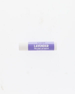 A single tube of lavender tallow lip balm with a purple label and white cap, centered on a plain white background.