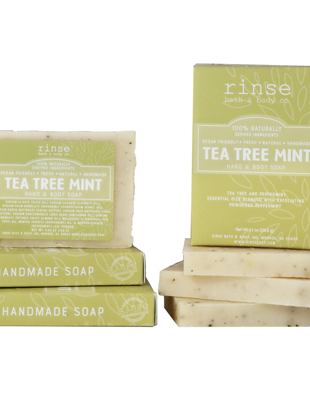 Mini Tea Tree Mint bars stack with mint wraps — speckled cream soaps on clean bright white