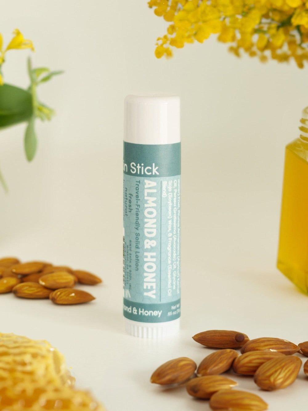 Almond & Honey Solid Lotion Skin Stick styled with almonds and honey — Rinse Bath & Body Co.