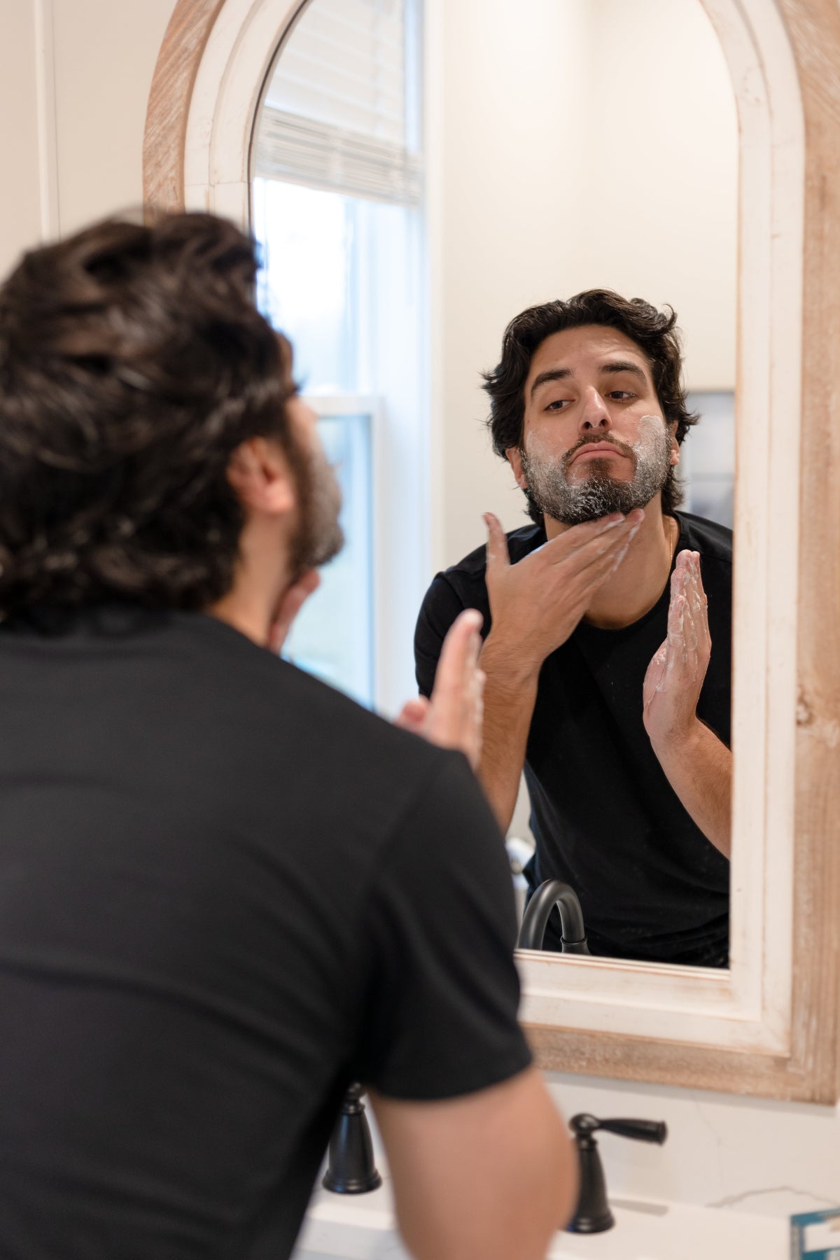 Beard Balm in use — included in the Beard Care display