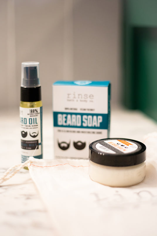 Rinse beard oil, beard soap and balm arranged on marble - Rinse Bath & Body