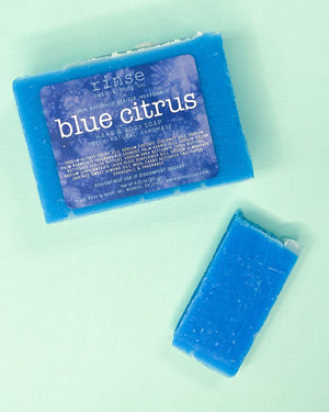 Labeled Blue Citrus bar and thin slice on pale mint — vibrant cerulean against cool green