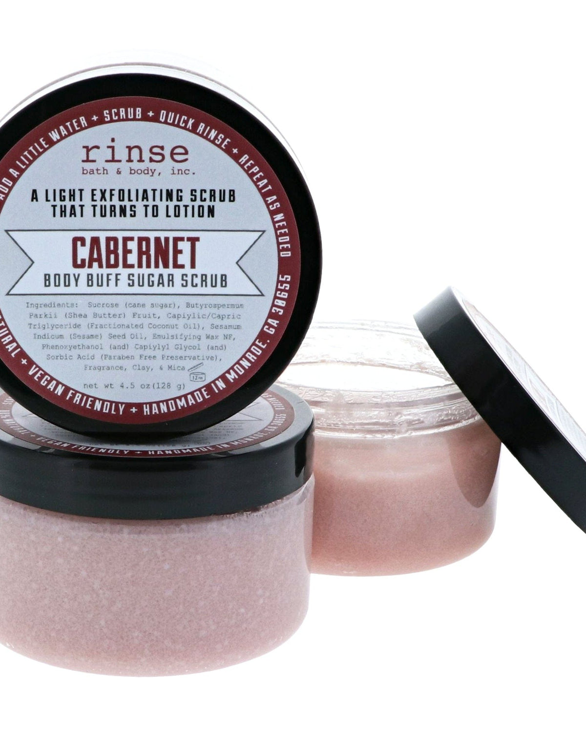 Open Cabernet Body Buff sugar scrub jar with dusty-rose scrub texture — light exfoliating wine scrub ready for the shower