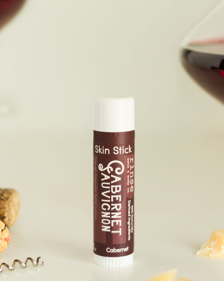 solid lotion stick in Cabernet by Rinse Bath & Body - lifestyle shot